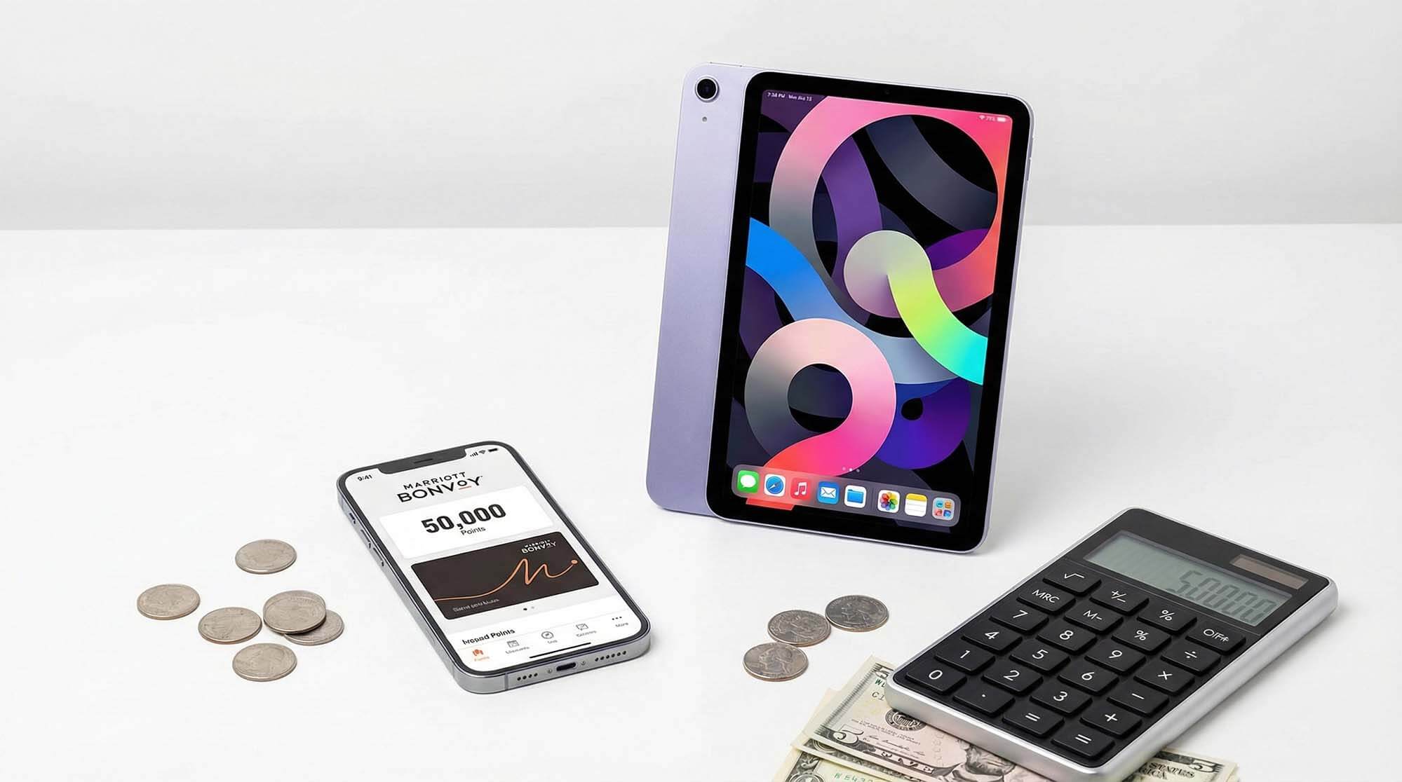 iPad Air 與萬豪旅享家 APP 顯示五萬積分示意圖